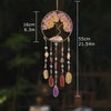A hanging crystal tree of life sun catcher featuring pink and yellow crystals with multiple dangling beads.