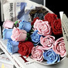 A bouquet of DIY rose flower building blocks in various shades of pink, blue, and red.