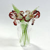 Hand-blown glass flower bouquet featuring deep red and green tulips in a clear glass vase