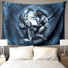 A dark blue and gray tapestry featuring an alien predator design with sharp teeth and wings.