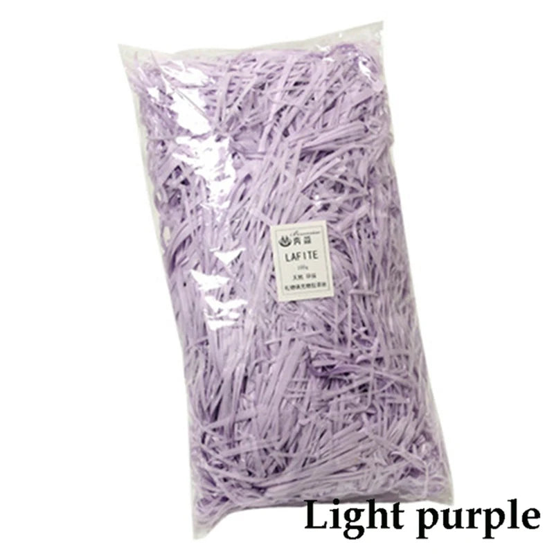 Bag of light purple lafite crinkle paper shreds for gift boxes and party decor