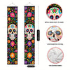 A vertical banner featuring a skull design surrounded by colorful flowers and foliage for Dia de Los Muertos decor