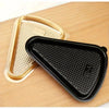 A gold and black disposable plastic cake slice container set shown on a wooden surface.