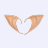 Ein Paar Vampirzähne Prothesen-Modelle in hellem Beige- oder Hautton.