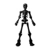A dark gray plastic skeleton figurine with articulated bones.