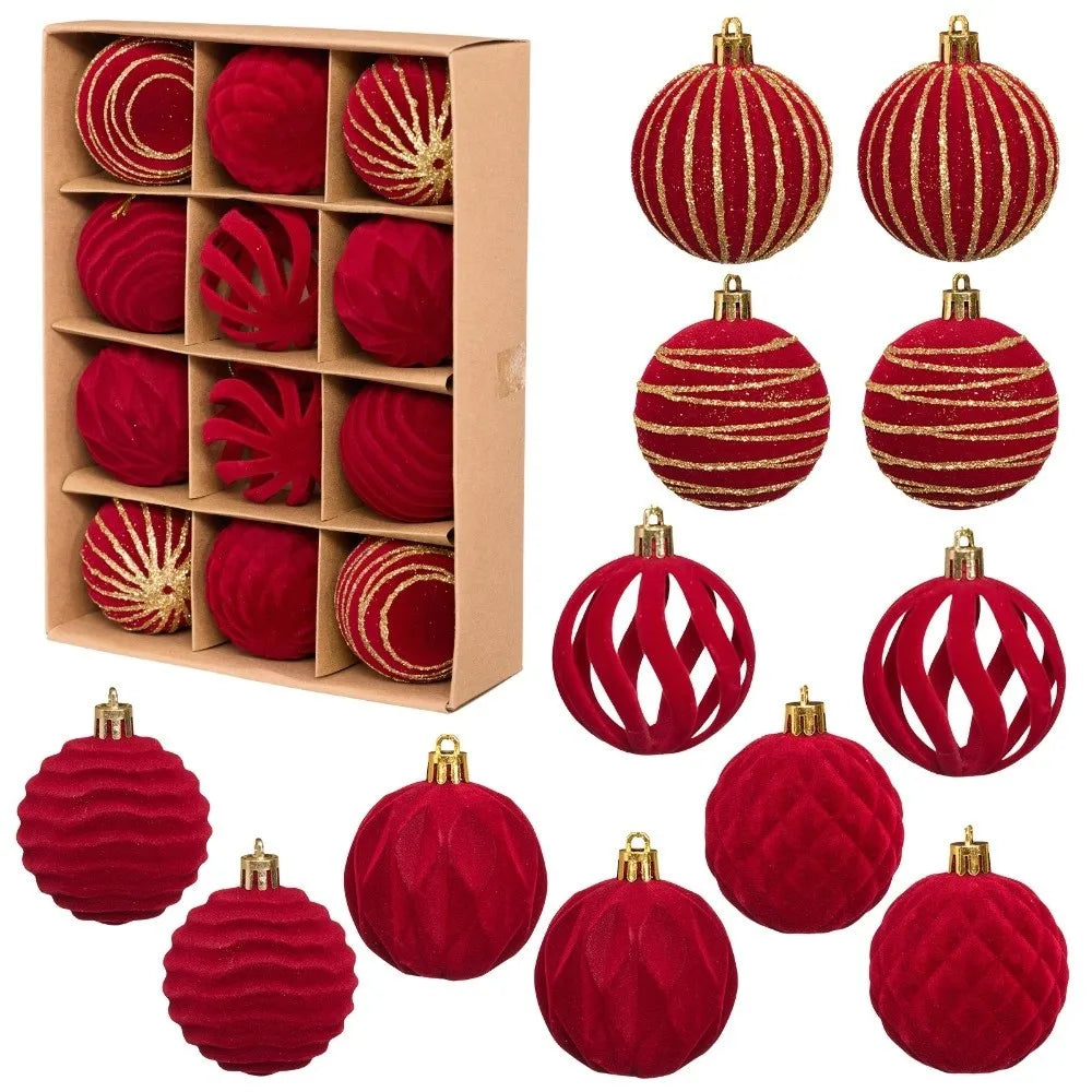 A set of twelve red velvet Christmas hanging ornaments, some with gold glitter accents, displayed in a cardboard box.