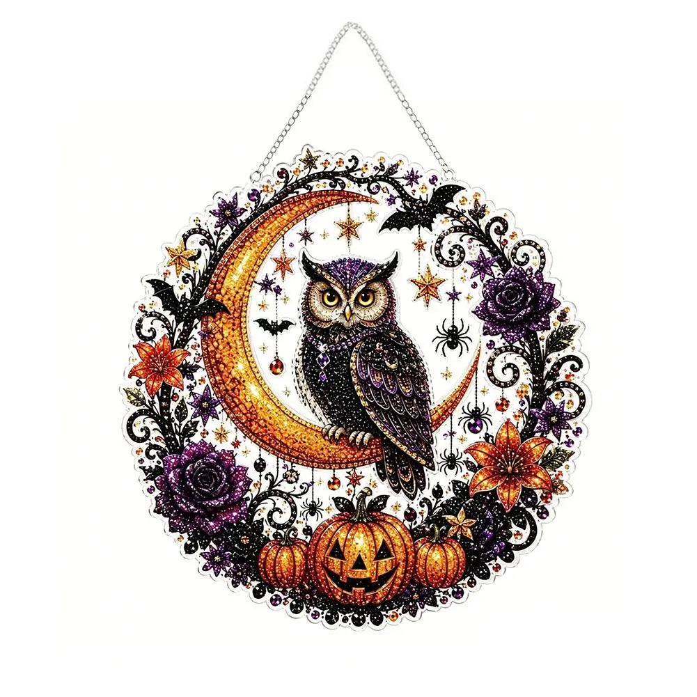 Diamond painting kit featuring an owl, black cat, moon, skull, and pumpkin designs on a circular piece.