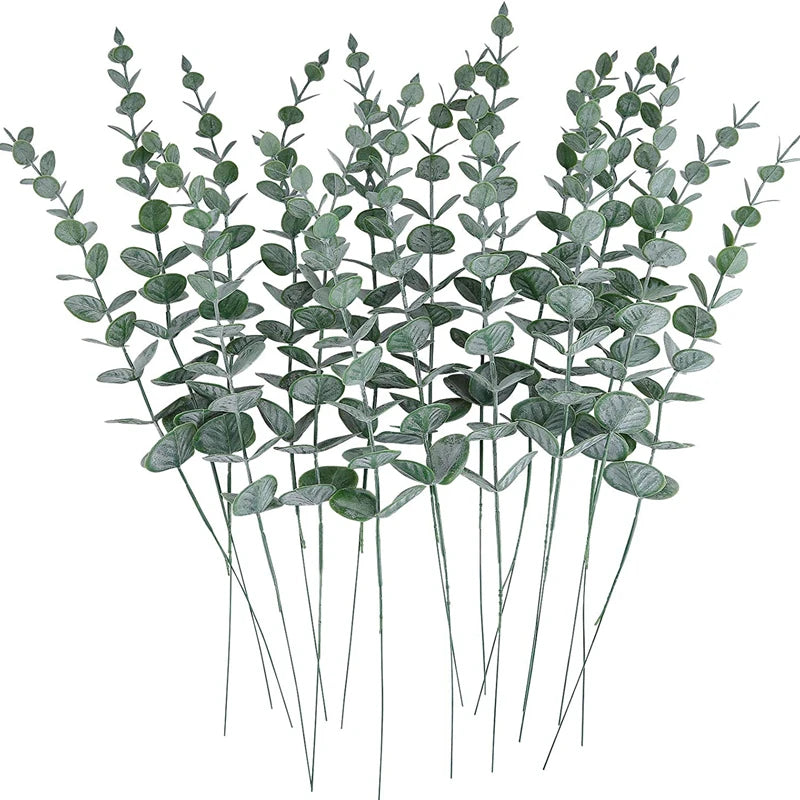 A sprig of artificial eucalyptus leaves with slender stems and rounded green foliage.