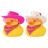 Two yellow rubber duck car dashboard decorations with pink cowboy hats and gold chains