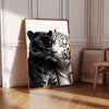 A canvas art print featuring a close-up of a black panther and a white tiger head side by side.