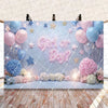 A gender reveal party decoration set featuring blue and pink balloons, stars, and floral arrangements.
