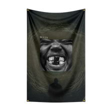 A dark tapestry featuring a close-up, intense facial portrait of a man with an open mouth and teeth showing.