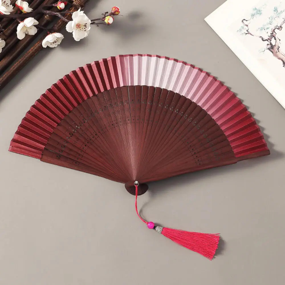 Traditional Bamboo Folding Fan with Solid Color Design