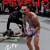 A muscular male fighter with tattoos is shown in a striking pose during a combat sports event.