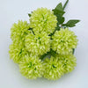 A bouquet of artificial light green hydrangea and camellia flowers.