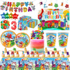 A colorful birthday party decoration set featuring building blocks, balloons, and themed characters.