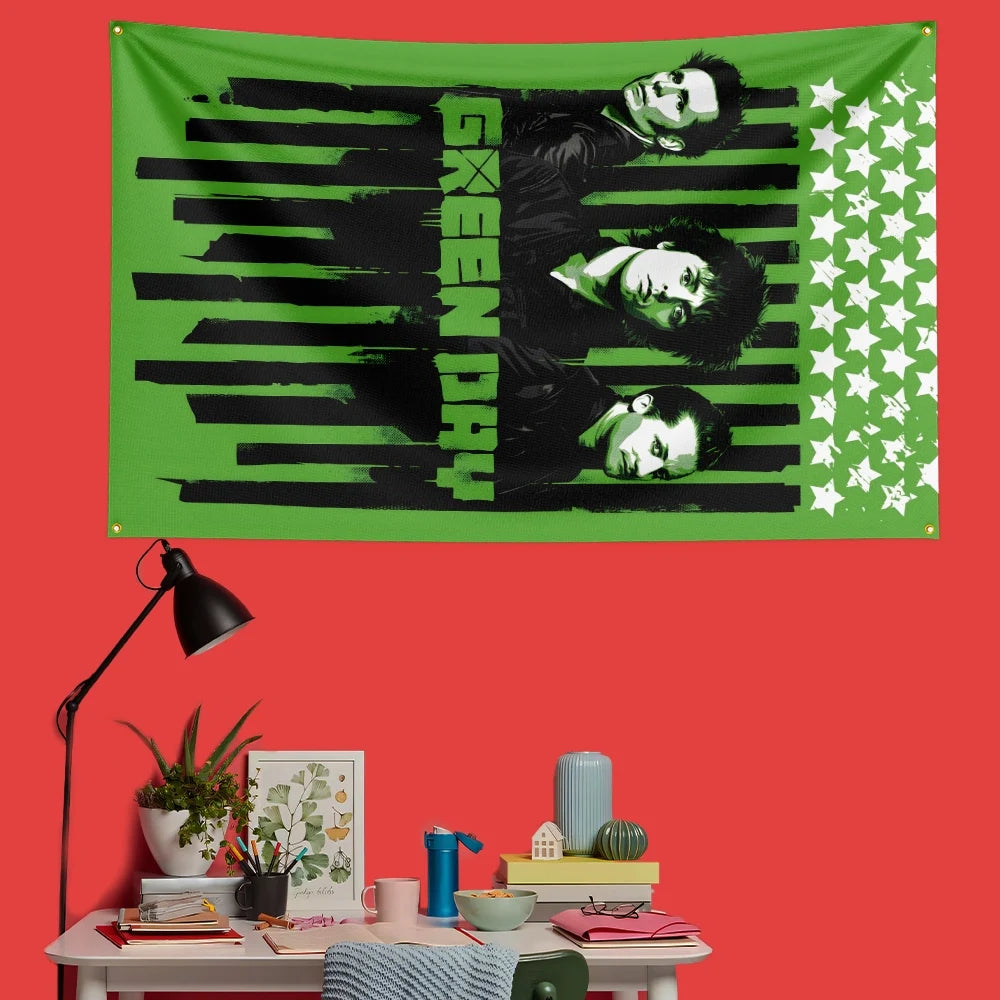 A green banner featuring a black and white graphic design with the text GREEN DAY and stars.