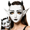 A woman is modeling a white horned fantasy creature mask with movable jaw.