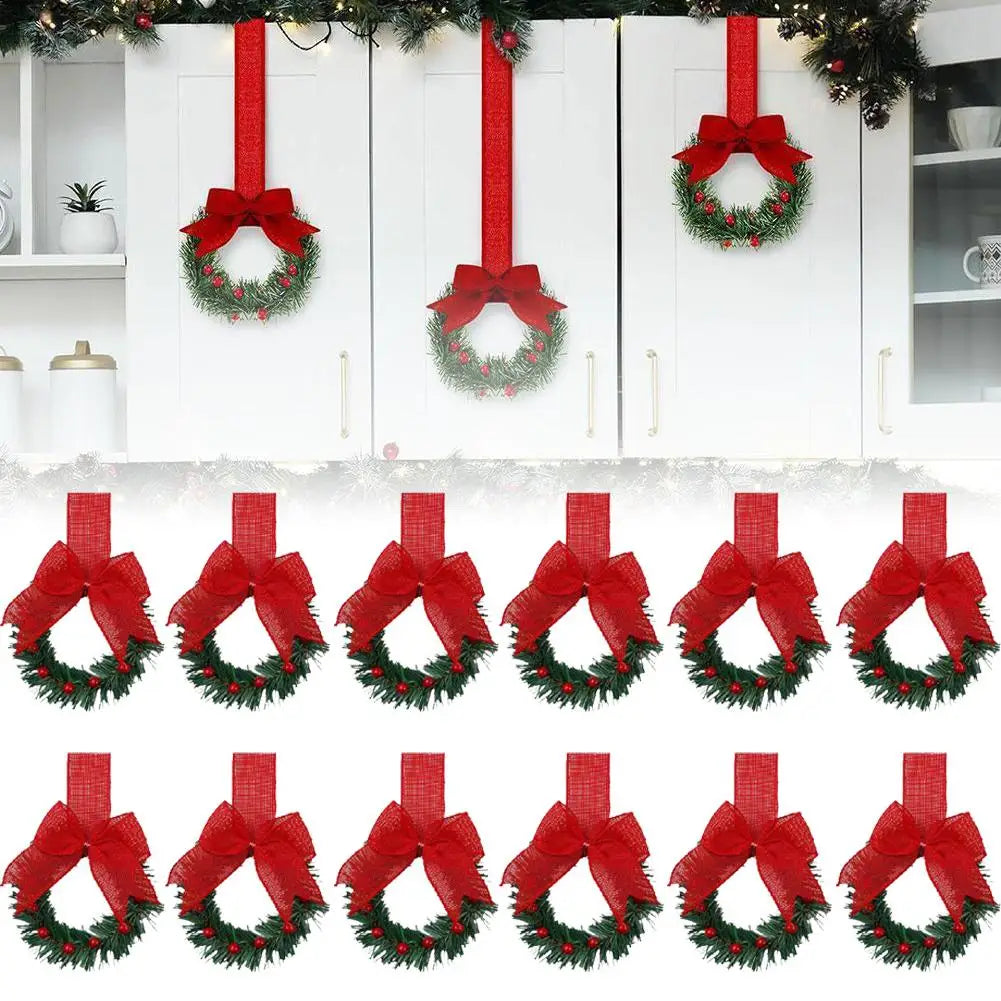 A set of ten-inch artificial Christmas wreaths with red berries and velvet bows displayed in various colors.