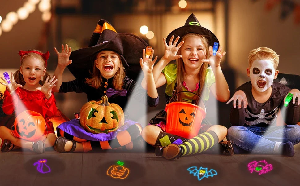 Four children pose with Halloween LED finger projectors casting spooky light patterns on a dark surface.