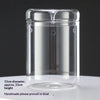 Clear glass cylindrical vase with a lid, used for decor.