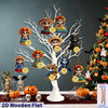 A display of flat wooden skull ornaments featuring various faces and colors for Halloween and Day of the Dead decor.
