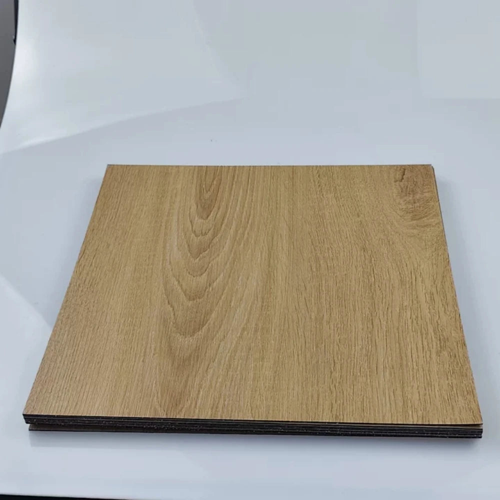 A rectangular sheet of light brown wood grain decor stickers, showing the natural texture and edge profile.