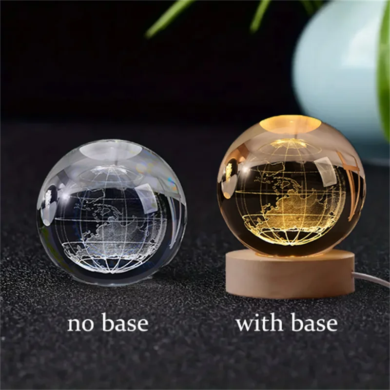 A comparison of a 3D crystal ball night light without a base and with a wooden base.