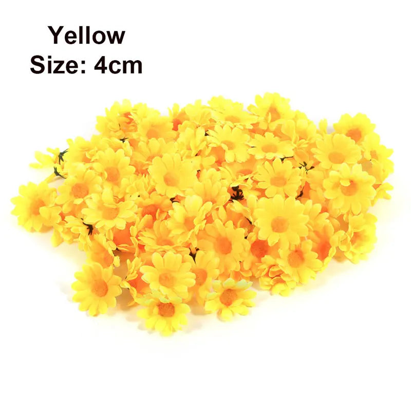 A pile of yellow artificial sunflower and daisy heads, size 4cm.