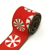Red and white candy cane patterned burlap ribbon rolled into a coil.