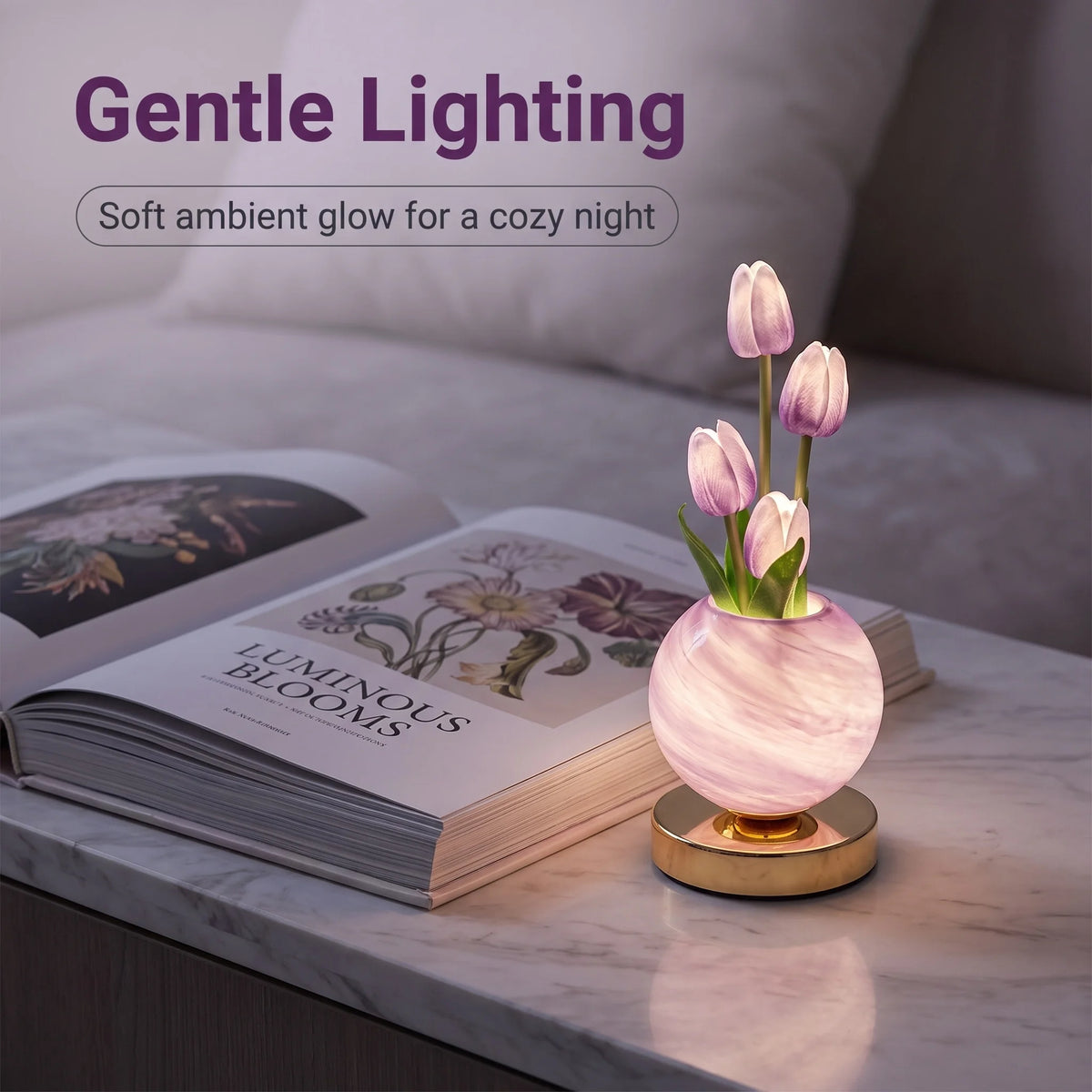 A pink marble vase holds a single light purple tulip, serving as a gentle lighting night light.