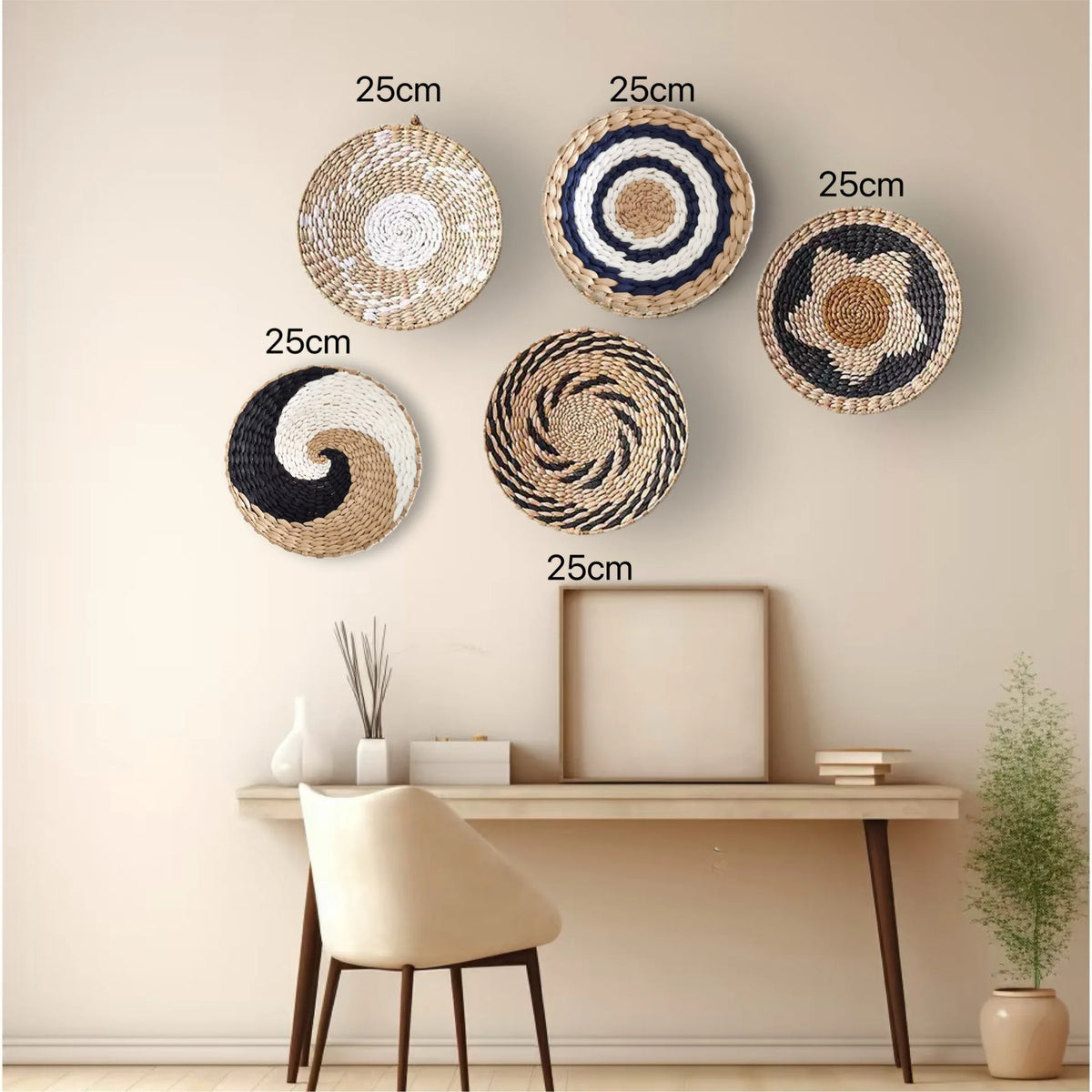 A collection of five round boho straw wall hangings with concentric patterns displayed on a light-colored wall.