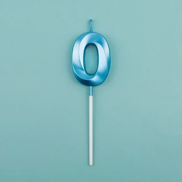 A blue birthday cake candle shaped like the number zero on a thin stick.