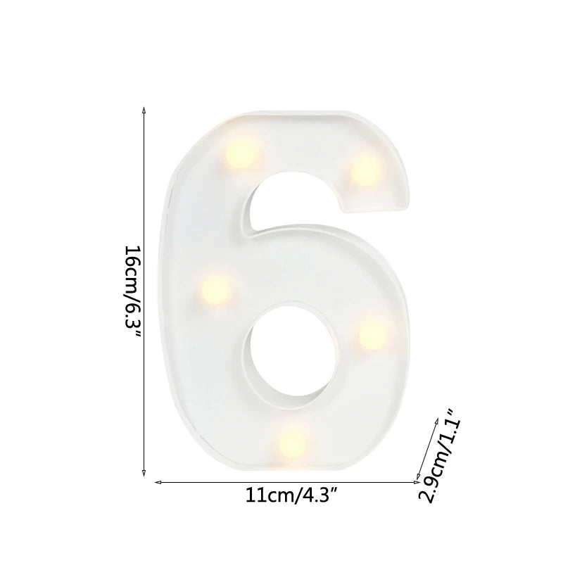 A white alphabet letter light shaped like the number six with warm white LED lights.