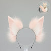 A set of faux fur fox tail and ear costume pieces, pink in color.