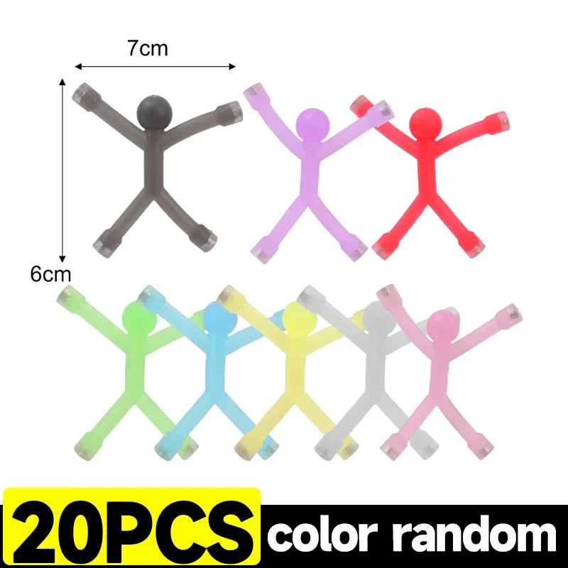 A set of 20 colorful flexible mini figures used as refrigerator magnets.