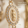 Gold pearl rhinestone cross keychain charm featuring an embossed Virgin Mary relief detail and crystal halo frame