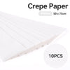 A stack of white crepe paper sheets, measuring 50 x 75cm, is shown in a diagonal view.