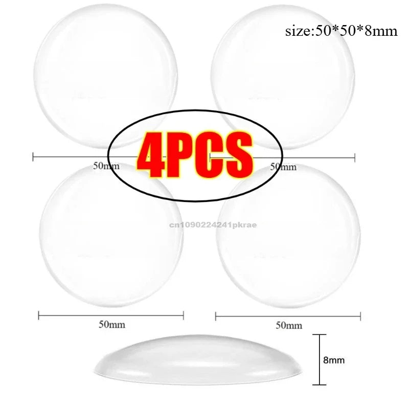 Four white silicone self-adhesive door stoppers or bumpers with a diameter of 50mm and thickness of 8mm.