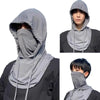 A person wearing a gray breathable UV protection balaclava face mask with a long neck cover.