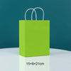 A bright lime green paper shopping bag with white handles, shown against a dark teal background.