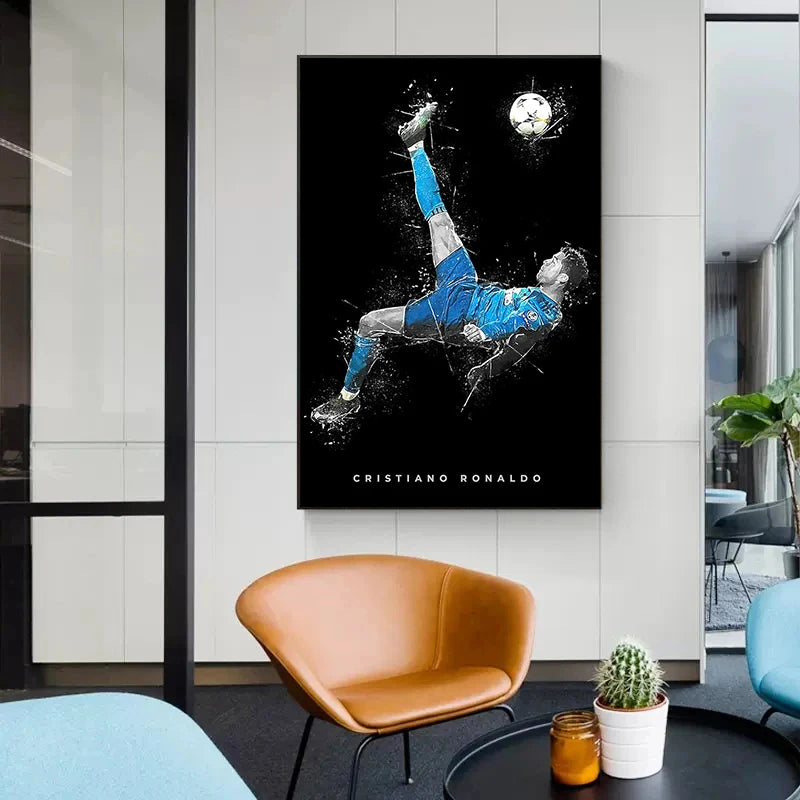 A framed canvas wall art featuring a black and white depiction of Cristiano Ronaldo celebrating a goal.