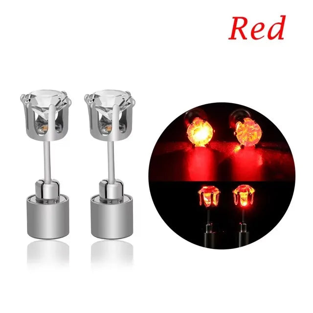 A pair of silver LED light-up flashing stud earrings with color-changing zircon stones.