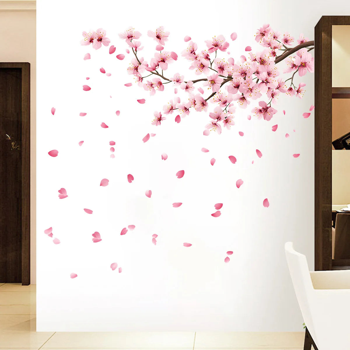 Pink peach blossom branch wall decals featuring delicate pink flowers and petals against a white background