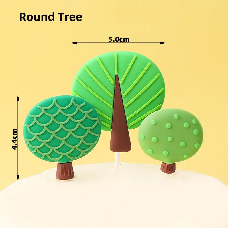 Green round tree cake topper with a brown trunk and needles, measuring 5.0cm tall.