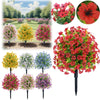 A collection of vibrant artificial flowers in various shades of red, pink, yellow, and purple displayed on stakes.