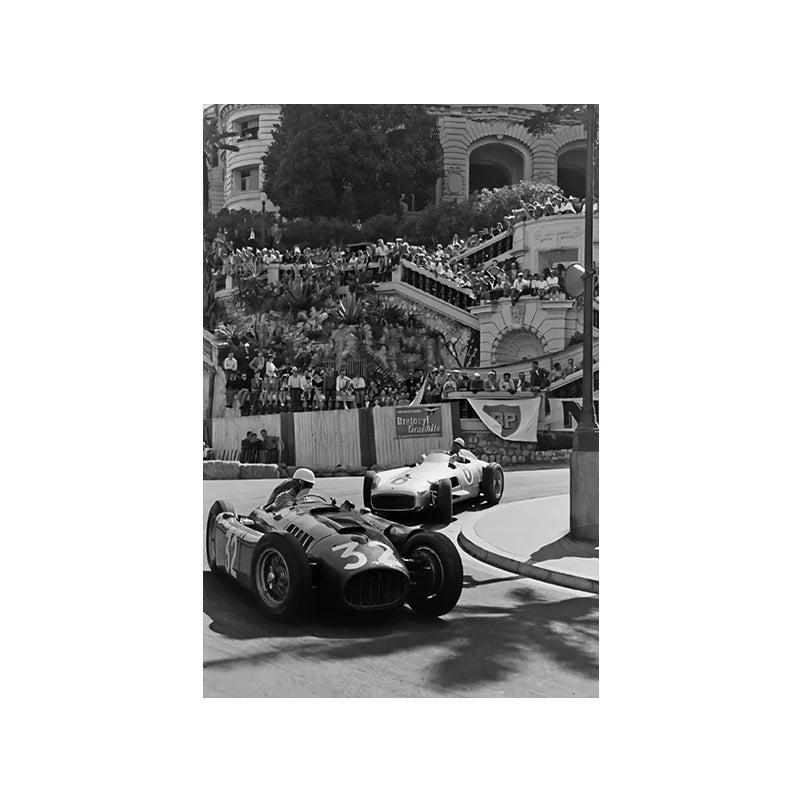 Black and white photo of a vintage Formula Grand Prix racing car on a track with spectators in the background.