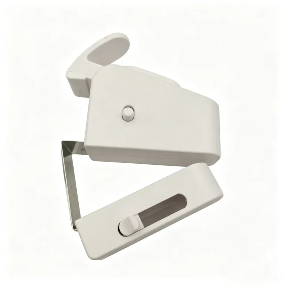 A white snap-on child safety door lock device with a hinged plate and a sliding mechanism.