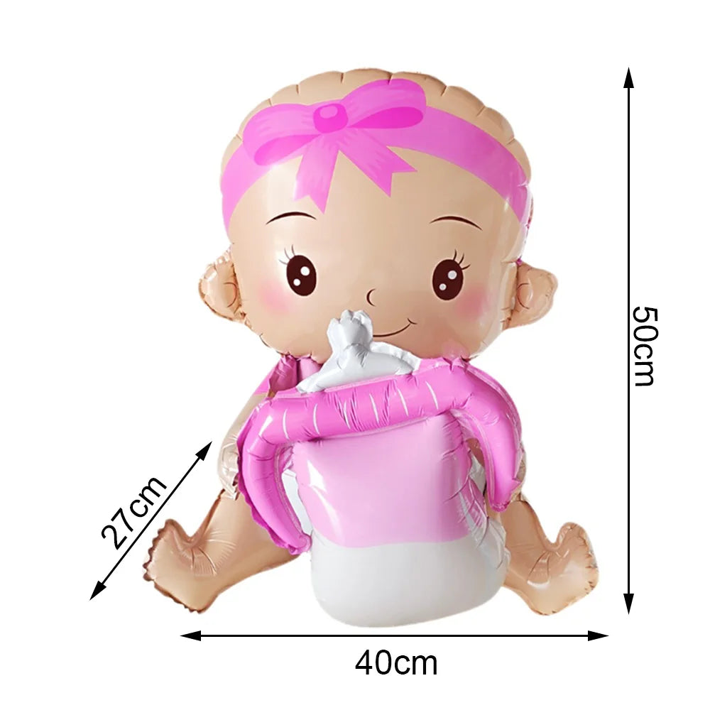 A pink foil baby bottle balloon shaped like a baby, decorated with a pink bow and wrapped in pink foil.