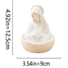 White resin figurine of the Virgin Mary with a draped veil for home decor